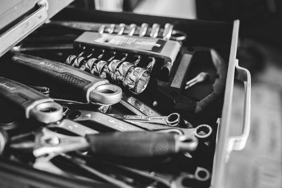 Drawer of DIY car maintenance tools used to save on shop labor cost