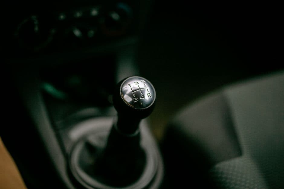 Manual transmission gear shifter and gear pattern inside a car
