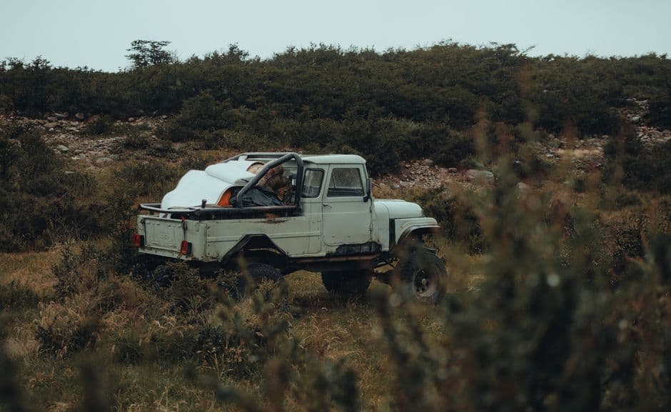 SUV navigating rugged outdoor terrain, the kind of driving that wears CV joints and wheel bearings faster